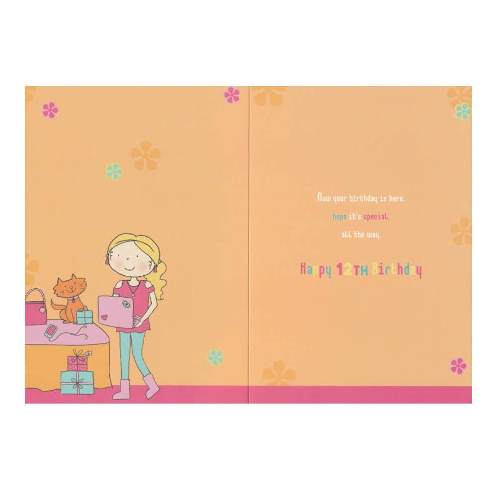 Front of this 12th birthday card card features an illustration of a girl with a pink laptop, paired with a message.