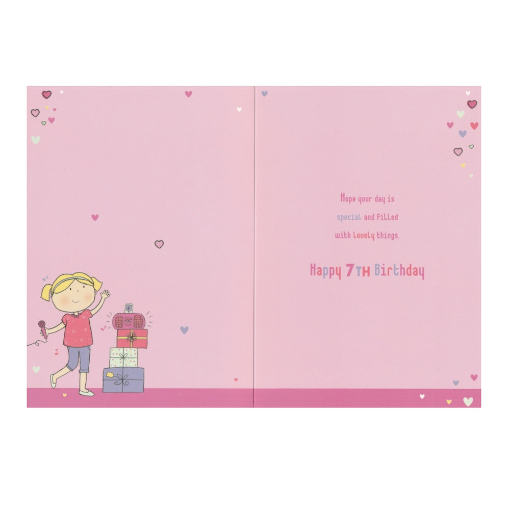 Front of this 7th birthday card features an illustration of a girl with a pink boombox, paired with a message.