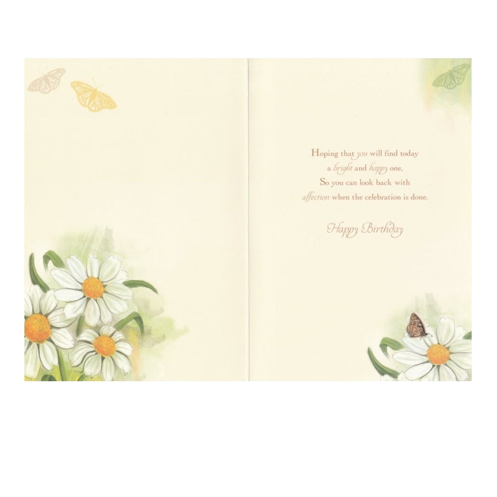 Front of this card features an illustration of white English daisies and a butterfly, paired with a message.