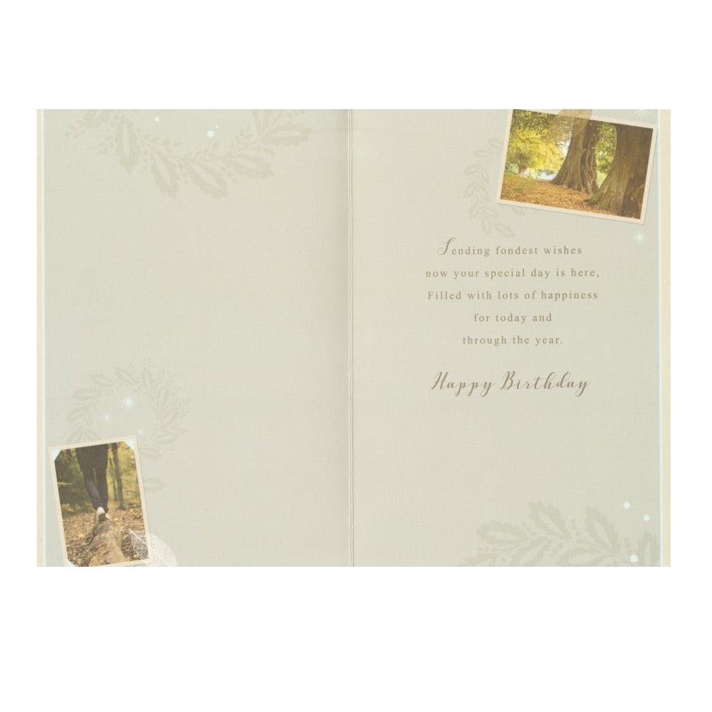 Front of this card features a photo of a person walking in a forest with a message that reads 'On Your Special Birthday' 'Wishing you... ...all the best!.
