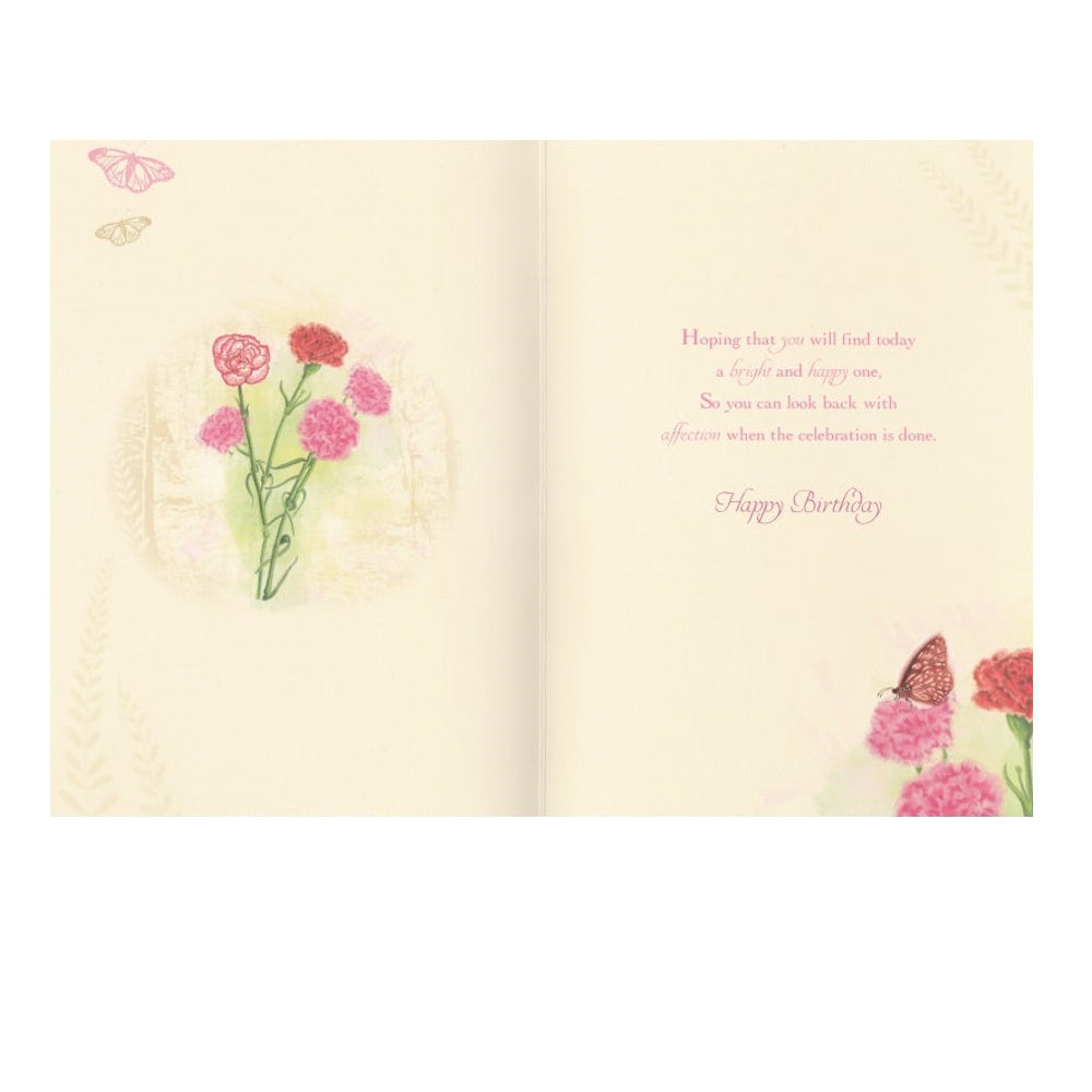 Front of this card features an illustration of a carnation flower and a butterfly, with the text 'Birthday Joy' and 'Wishing you lots of special moments'.
