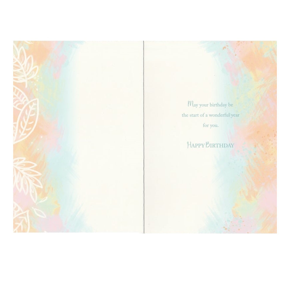 Front of this card features an illustration of leaves and a verse wishing joy on the recipient's birthday.