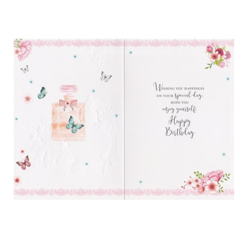 Front of this card features an illustration of flowers, butterflies and perfume bottles, paired with a message.