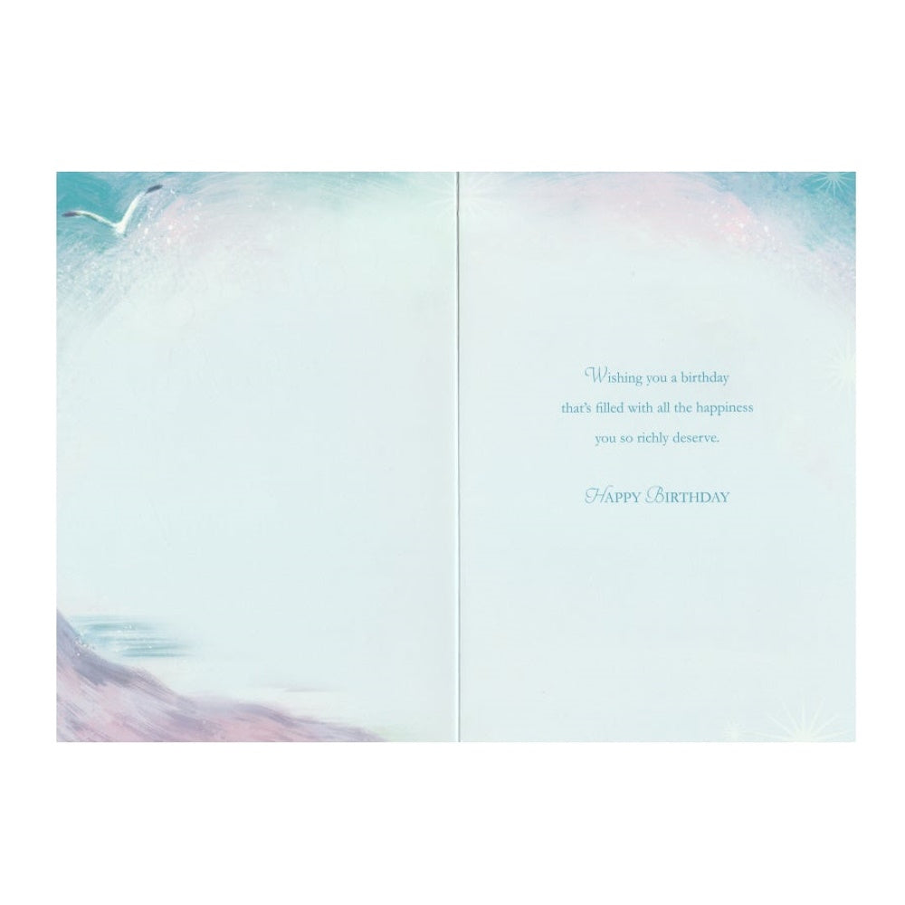 Front of this card features an illustration of a sea scene, with the message 'Thinking of You On Your Birthday. Hope your birthday is a day to relax and enjoy the beautiful things in life...'.