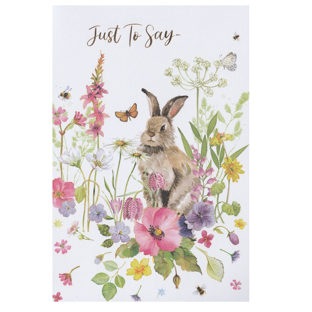 Front of this card features an illustration of an hare surrounded by flowers with the text 'Just To Say' at the top.