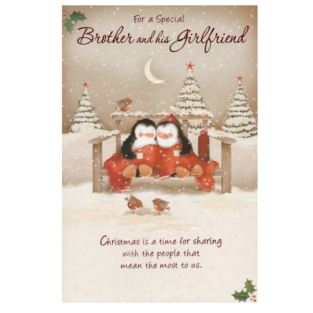 Front of this card features an illustration of two penguins cuddling under a blanket in a snowy scene, paired with a message.