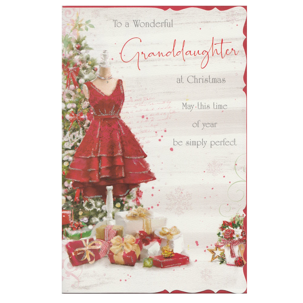 Front of this granddaughter Christmas card features an illustration of a Christmas tree with presents underneath and a red glittered party dress, paired with a message.
