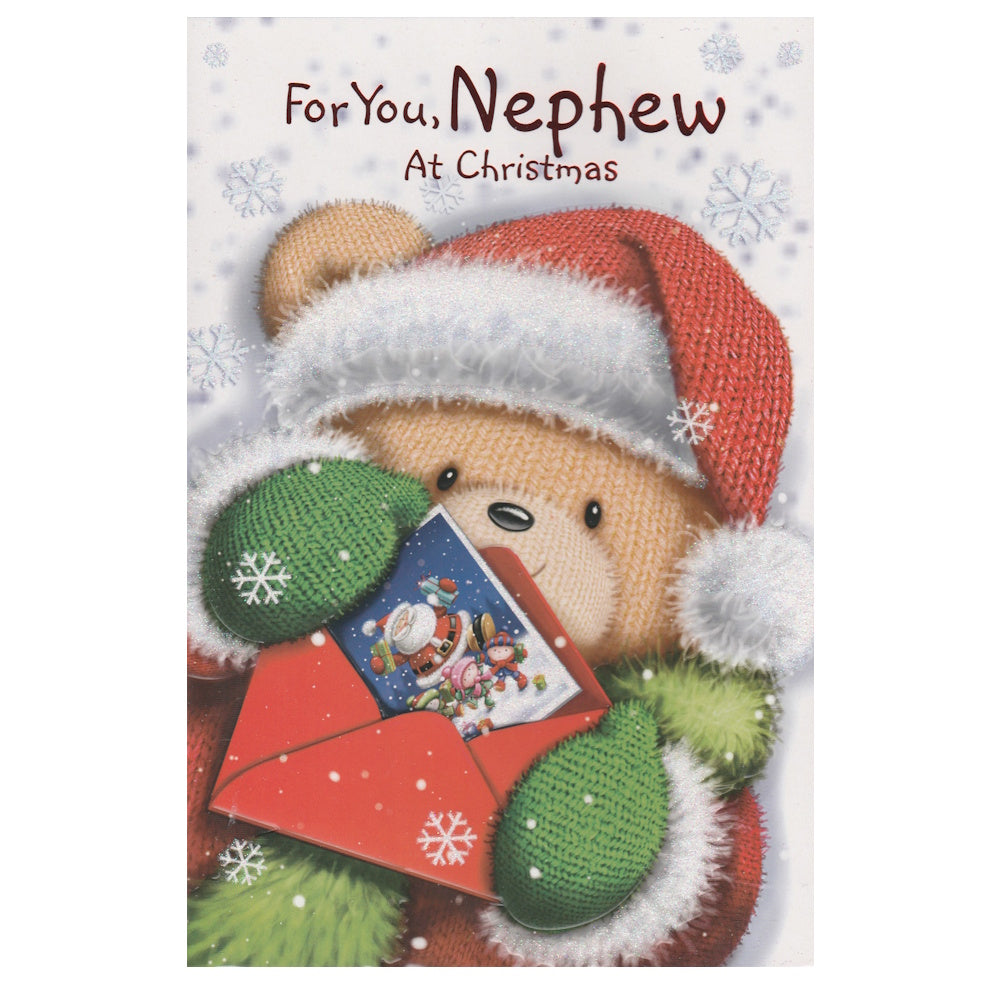 Front of this nephew Christmas card features an illustration of a teddy bear holding a Santa themed card and envelope, paired with a message.