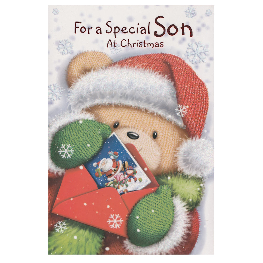Front of this son Christmas card features an illustration of a teddy bear holding a Santa themed card and envelope, paired with a message.
