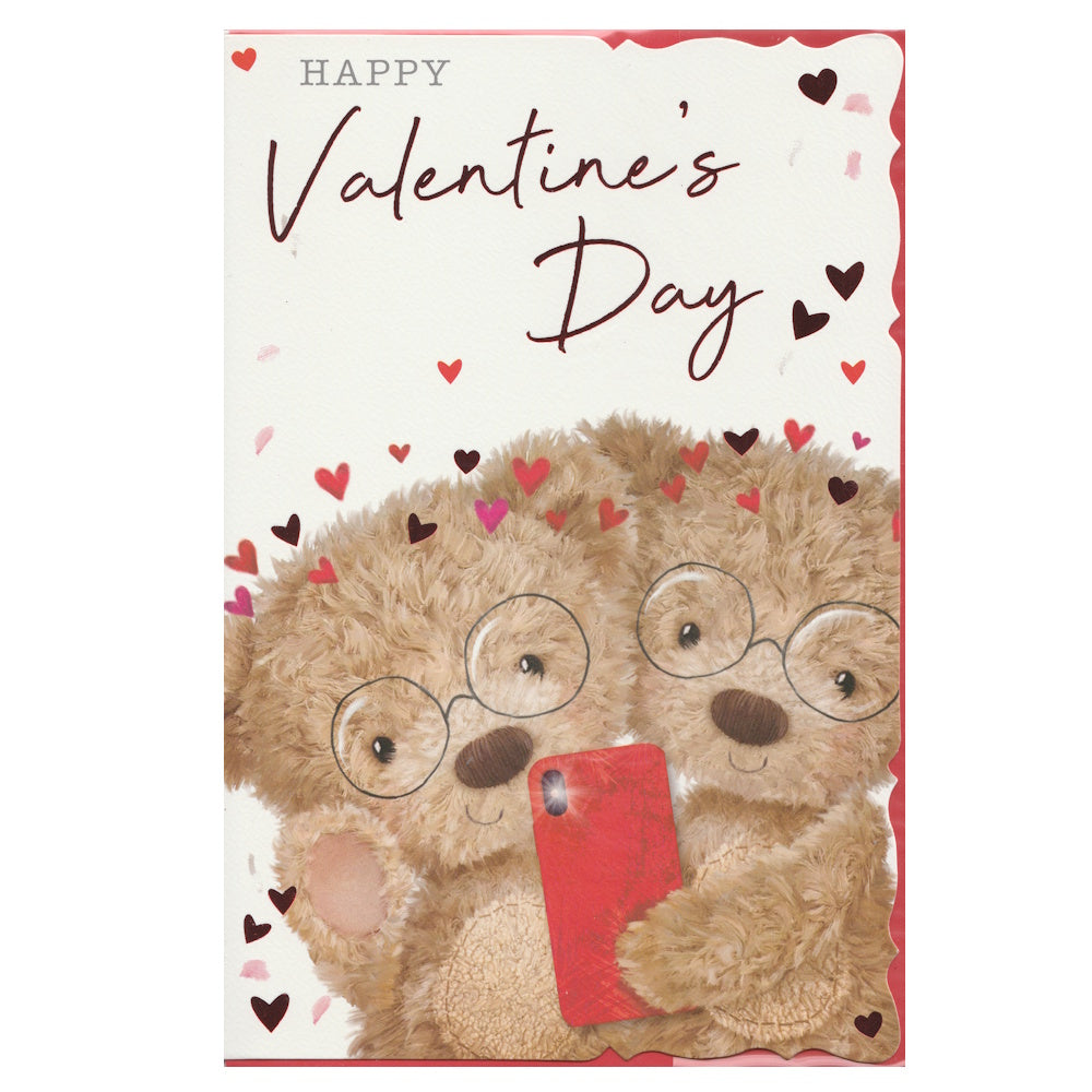 Front of this valentine's day card features an illustration of two teddy bears wearing spectacles, surrounded by love hearts, paired with a message.