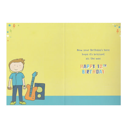 Front of this 12th birthday card features an illustration of a boy with a guitar and a guitar amp, paired with a message.