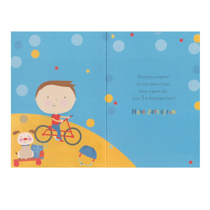 Front of this 5th birthday card features an illustration of a boy on a red bicycle, paired with a message.