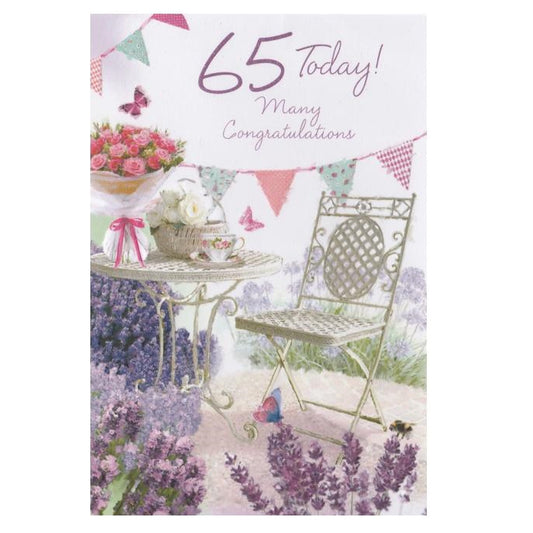 Front of this 65th birthday card features an illustration of a garden table setting, paired with a message.