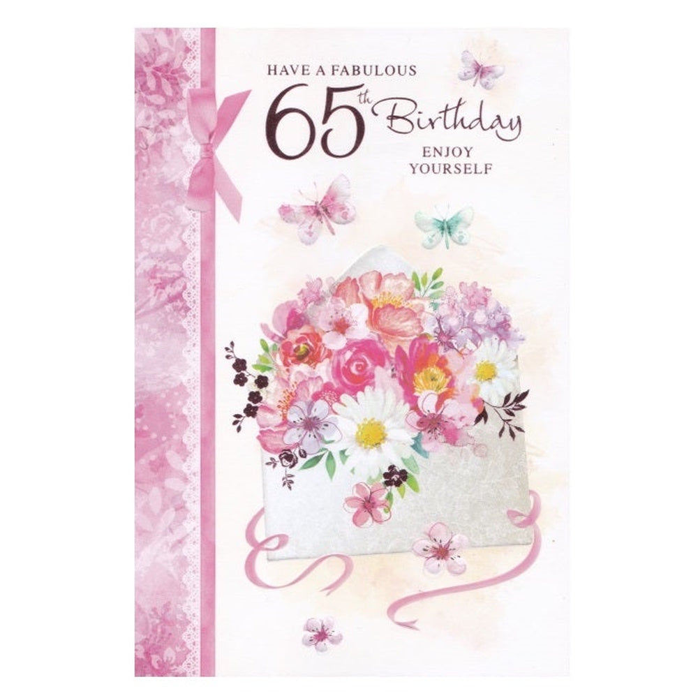 Front of this 65th birthday card features an illustration of a envelope filled with flowers, paired with a message.