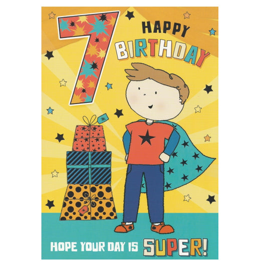Front of this 7th birthday card features an illustration of a boy dressed in a cape with a stack of presents, paired with a message.