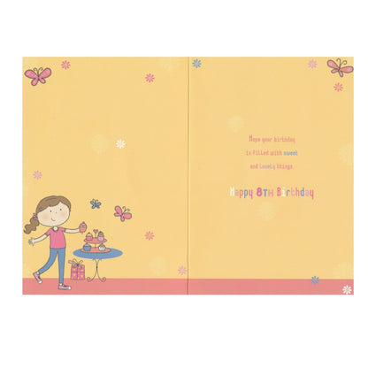 Front of this 8th birthday card features an illustration of a girl with cupcakes, paired with a message.