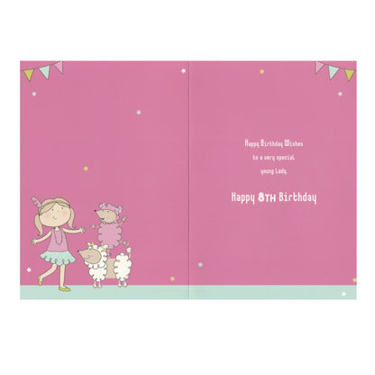 Front of this 8th birthday card features an illustration of a girl with two poodles, paired with a message.