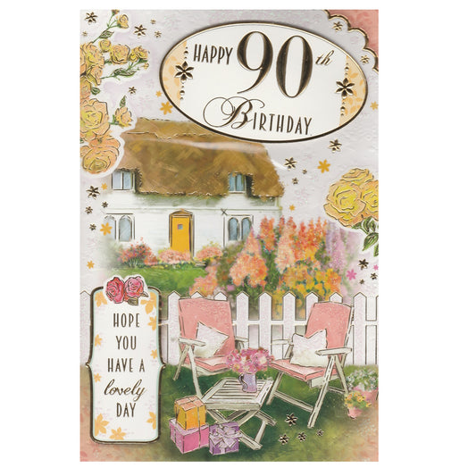 Front of this 90th birthday card features the text ''Happy 90th Birthday' with an illustration of a thatched cottage and a garden scene.