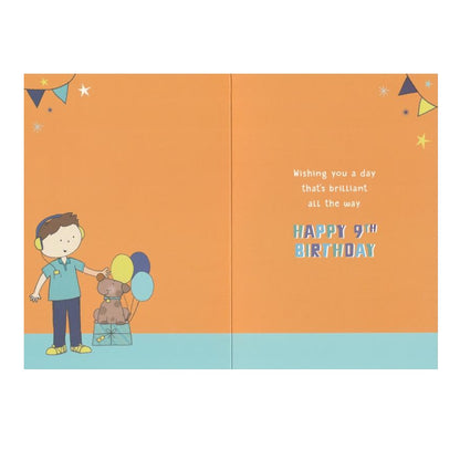 Front of this 9th birthday card features an illustration of a boy and a dog, paired with a message.