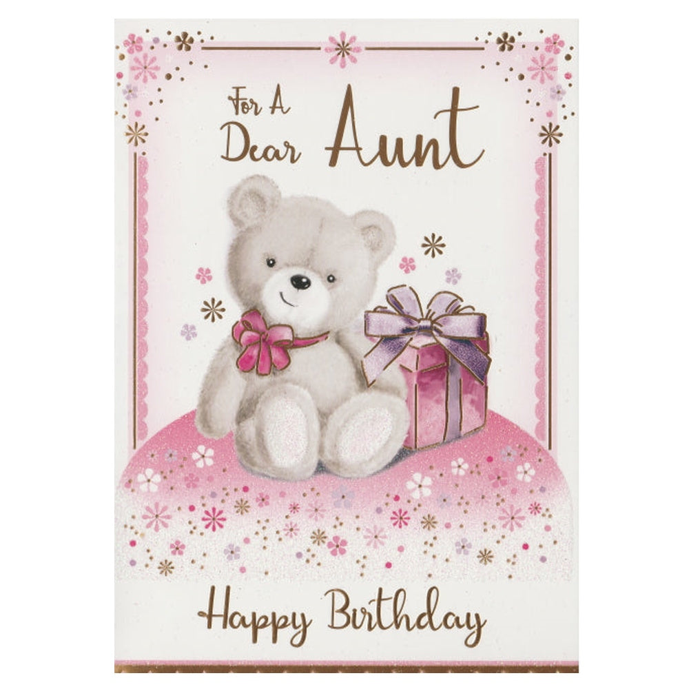 Front of this birthday card features an illustration of a teddy bear with a present, and the text 'To a Dear Aunt, Happy Birthday', as shown in product photo.