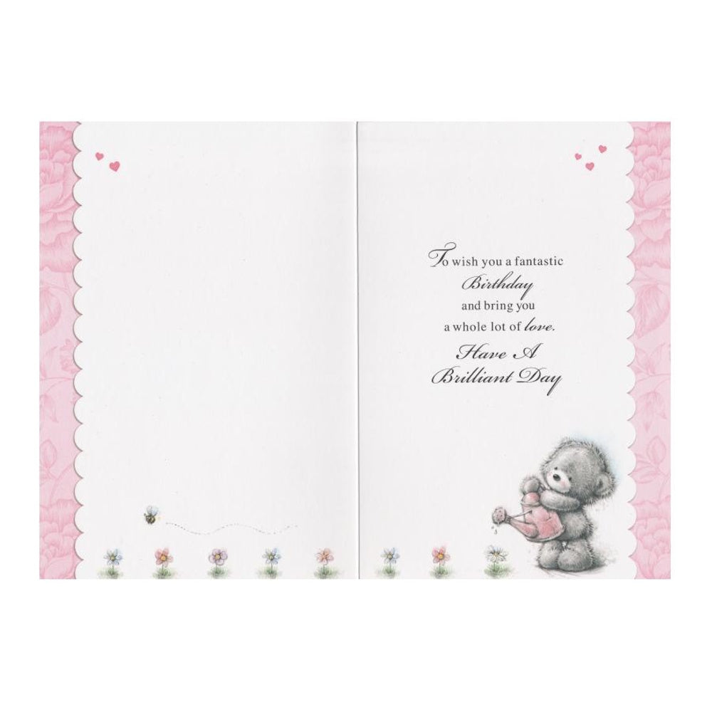 Front of this auntie birthday card features a bear watering a flower, with the text 'To Auntie, Enjoy Yourself! A Birthday Message Especially For You'.as shown in product photo.
