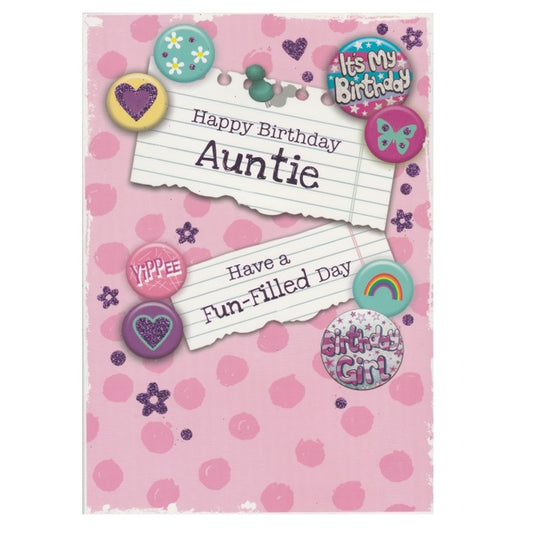Front of this auntie birthday card features the text 'Happy Birthday Auntie Have a Fun-Filled Day' on a pink patterned background with an illustration of colourful badges, as shown in product photo.
