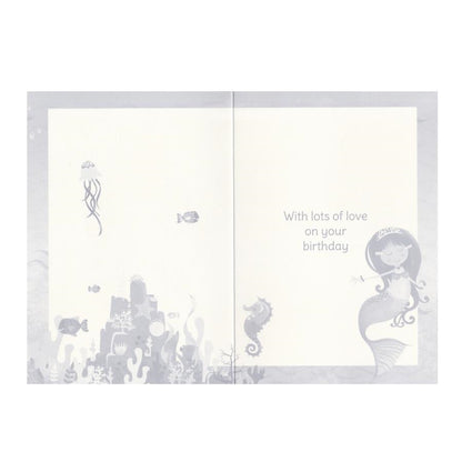 Front of this auntie birthday card features a cartoon illustration of a mermaid with a 'Happy Birthday, Auntie' message, along with various sea creatures on a underwater themed background.