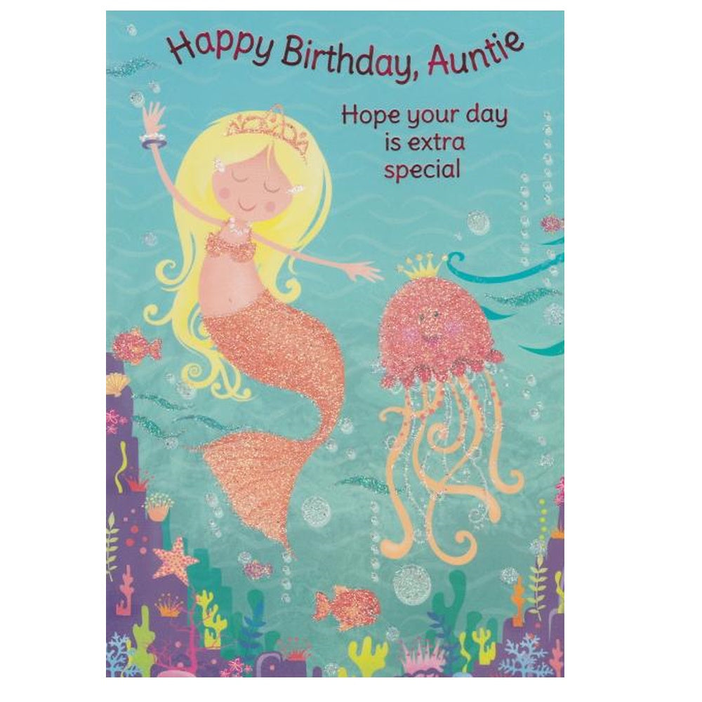 Front of this auntie birthday card features with an illustration of a yellow-haired mermaid in a blue dress with a crown and a pink jellyfish.