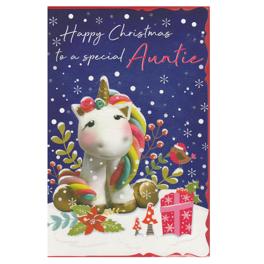 Front of this auntie Christmas card features an illustration of a unicorn surrounded by snowflakes, paired with a message.