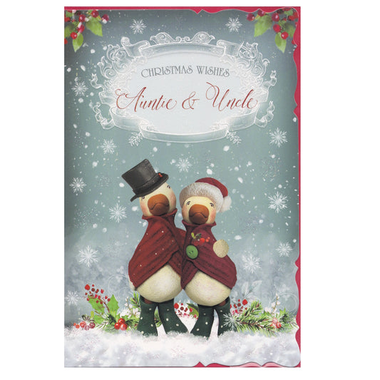 Front of this aunt and uncle Christmas card features an illustration of two Christmas geese surrounded by snowflakes, paired with a message.
