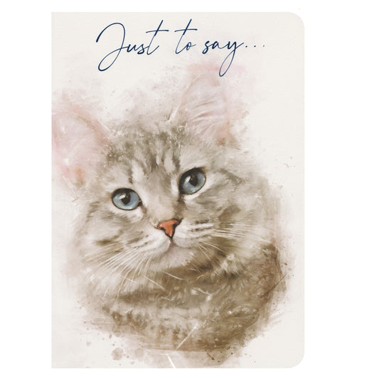 Front of this blank greeting card features an illustration of a pretty cats face with blue eyes, paired with a message.