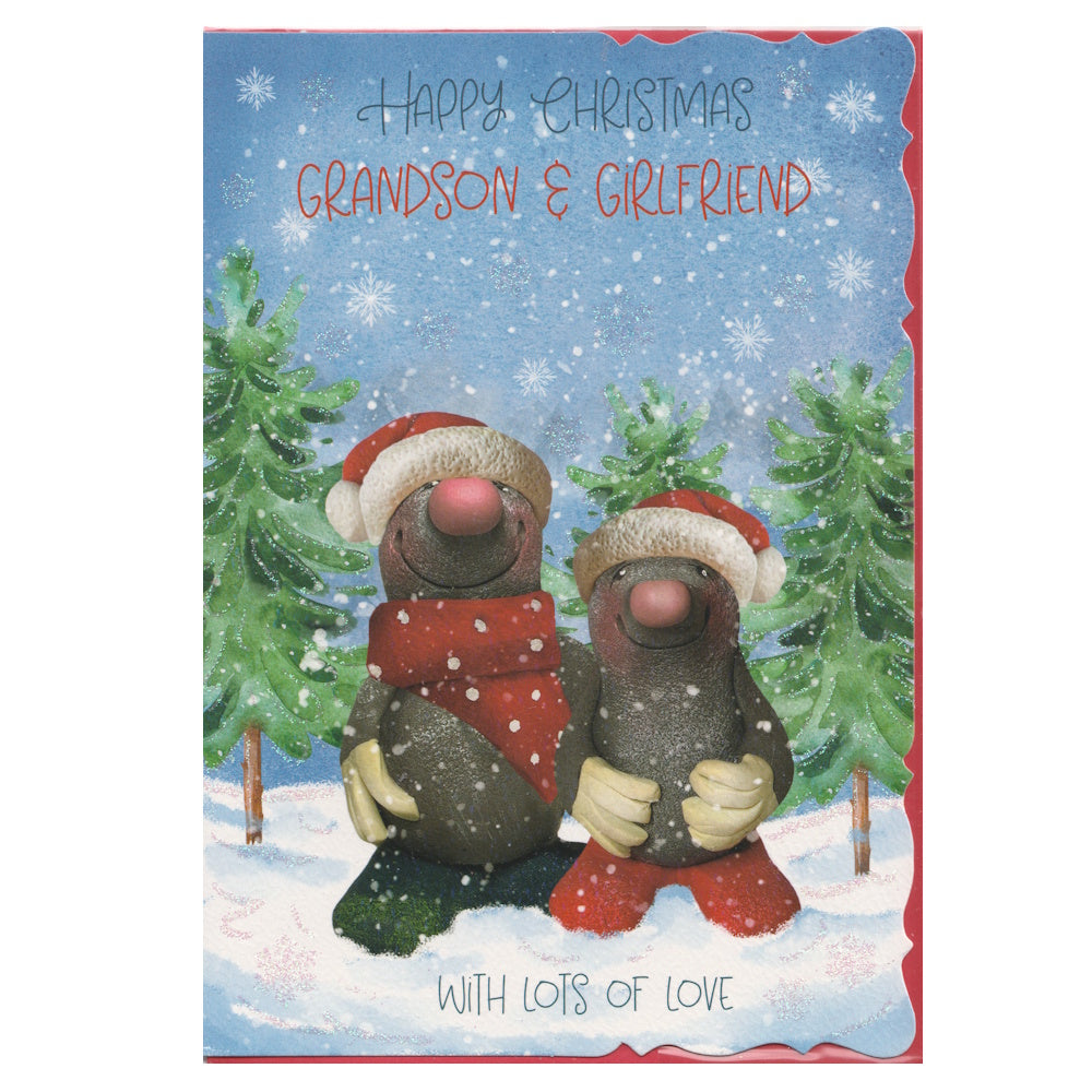 Front of this card features a illustration of two moles wearing Santa hats in a snowy forest of fir trees, paired with a message.