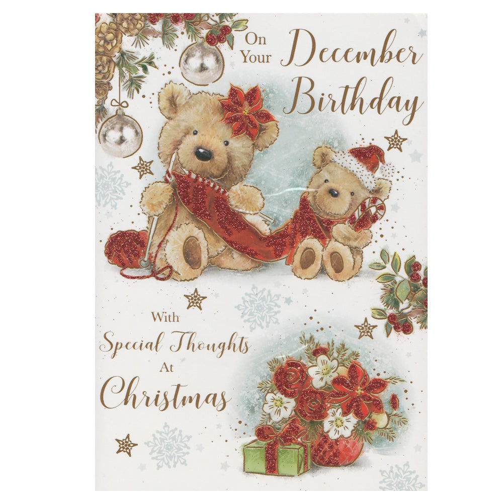 Front of this December birthday card features an illustration of two teddy bears dressed for Christmas, paired with a message.