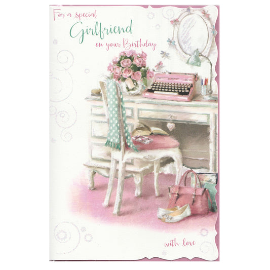 Front of this card features an illustration of a pink typewriter and desk, with the text 'For a special Girlfriend on your Birthday' and 'With love'.