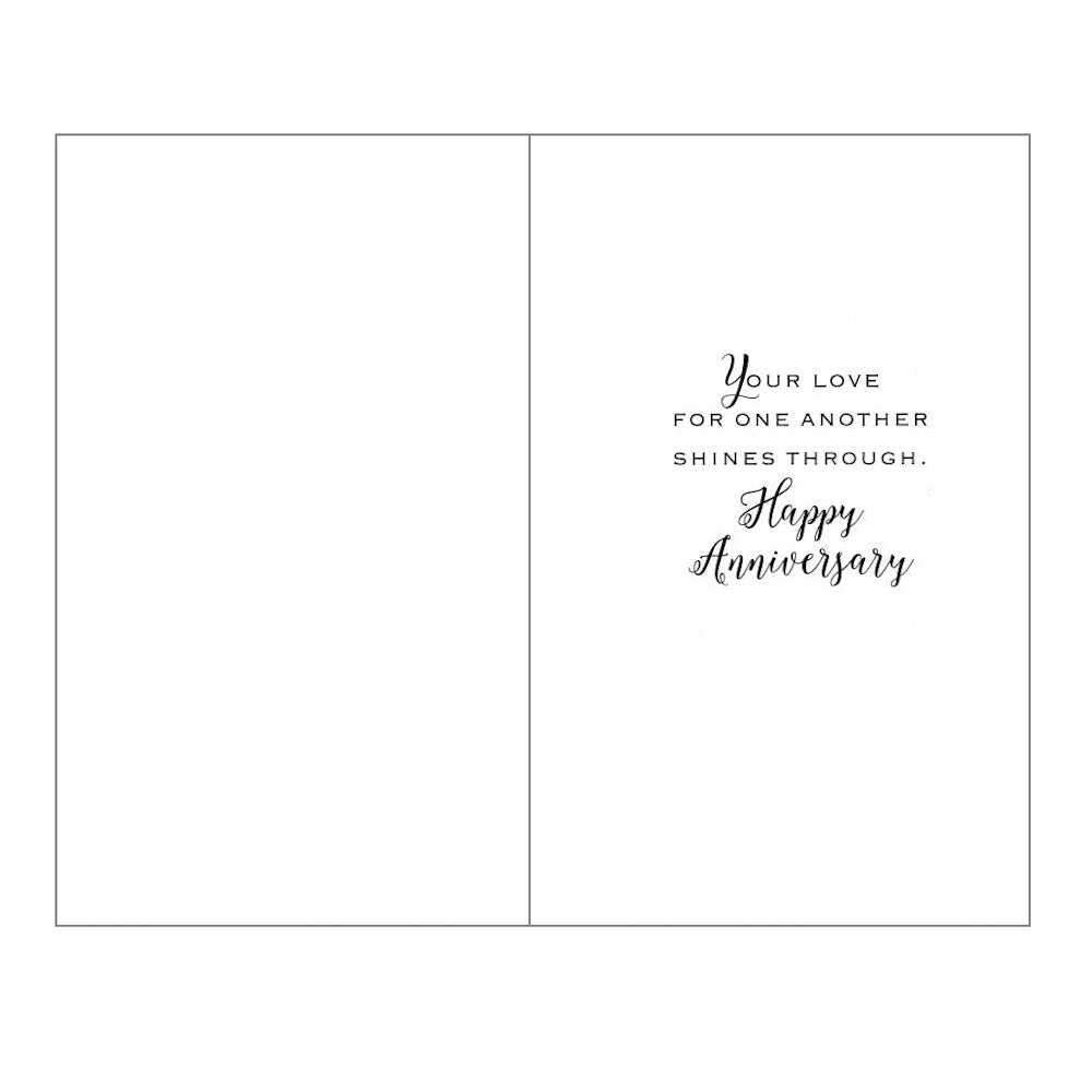 This golden anniversary card has illustrations of two love hearts filled with words of love on a white background, paired with a message. Gold foil detail.