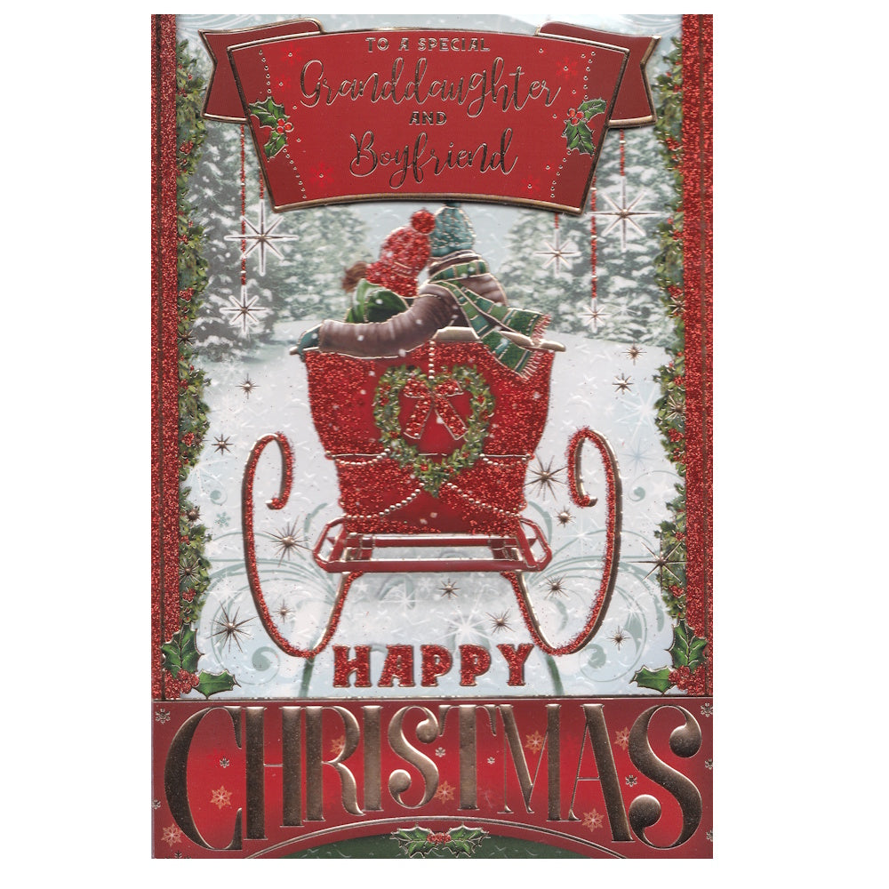 Front of this granddaughter & boyfriend Christmas card features an illustration of a couple sat in a Christmas themed sleigh with the text 'TO A SPECIAL Granddaughter and Boyfriend' ' Happy Christmas'.