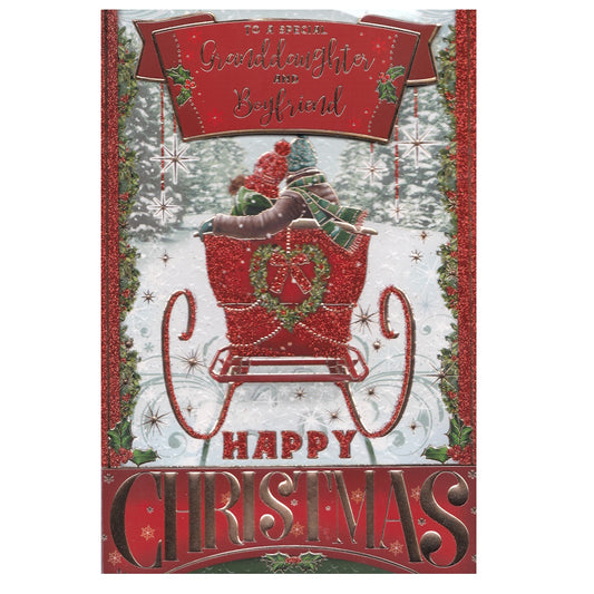 Front of this granddaughter & boyfriend Christmas card features an illustration of a couple sat in a Christmas themed sleigh with the text 'TO A SPECIAL Granddaughter and Boyfriend' ' Happy Christmas'.
