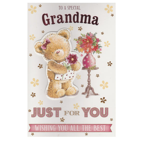 Front of this grandma birthday card features an illustration of a bear and a vase of flowers, paired with a message,