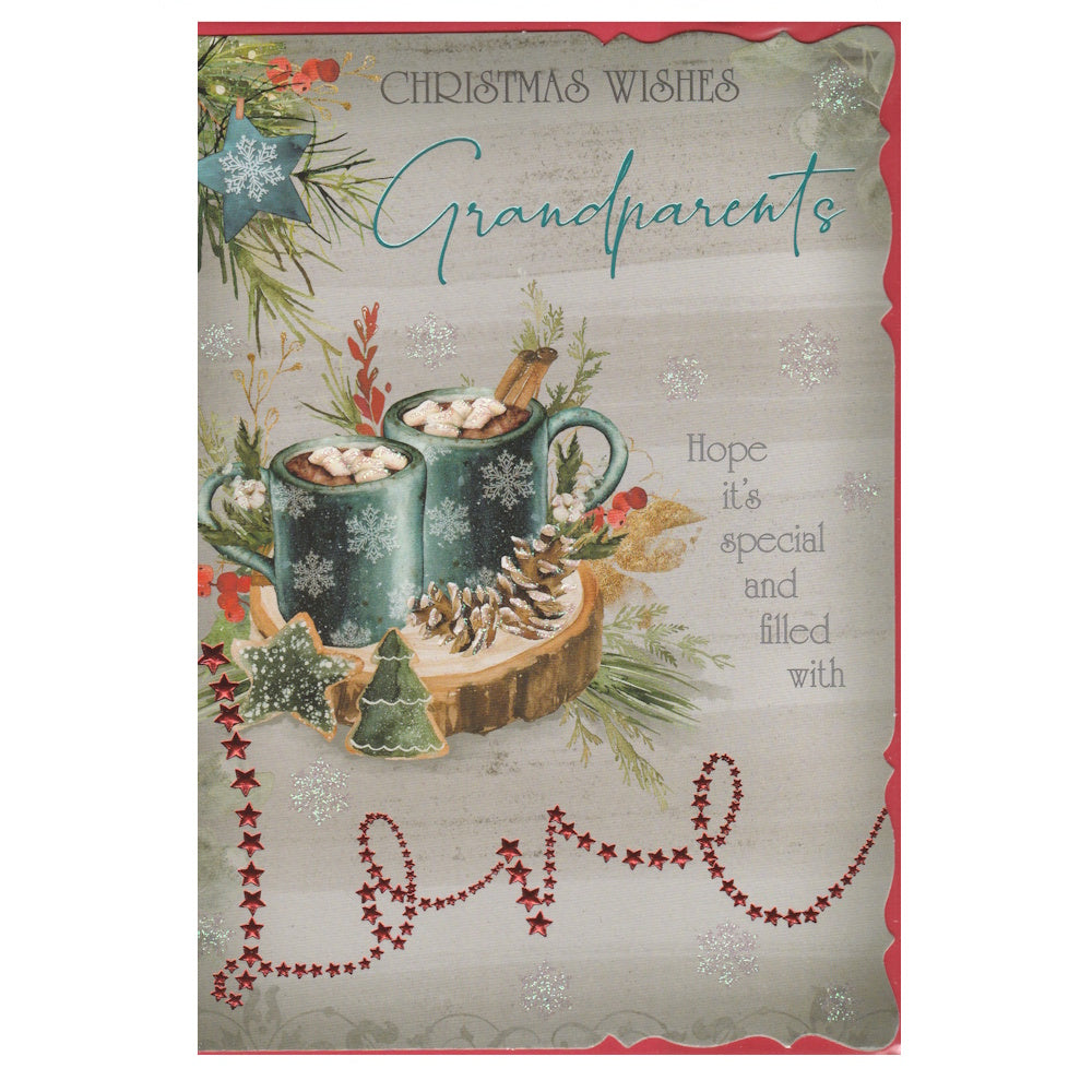 Front of this grandparents Christmas card features a illustration of two blue mugs, surrounded by Christmas foliage, paired with a message.