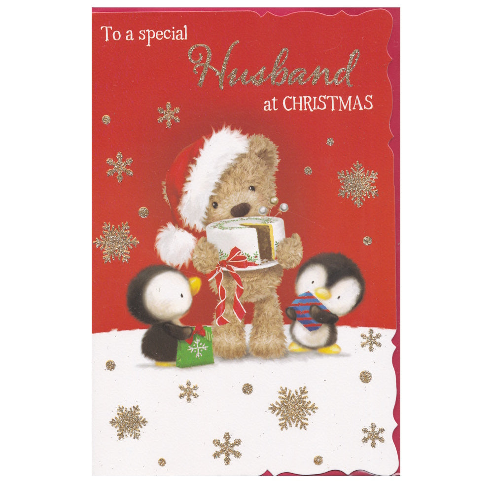 Front of this husband Christmas card features an illustration of a teddy bear carrying a Christmas cake with two little penguins, paired with a message.