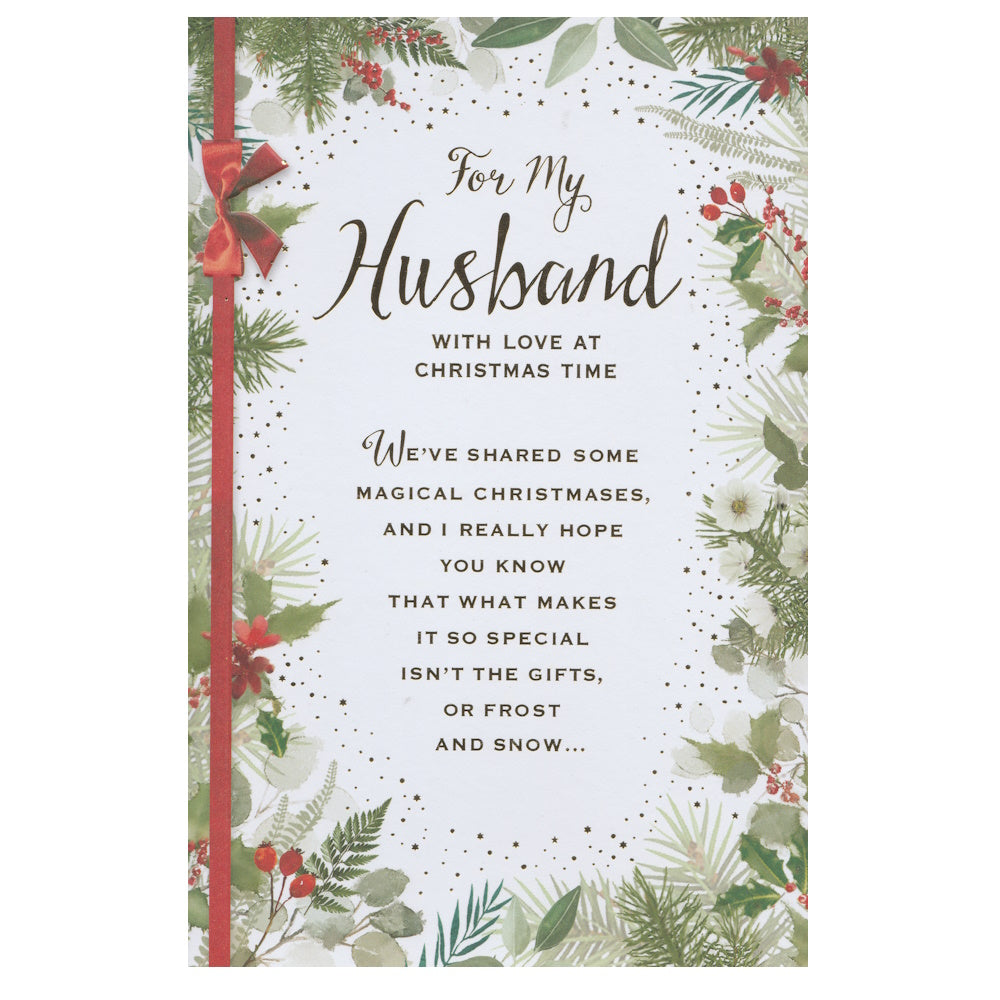 Front of this husband  Christmas card features a lovely Christmas themed verse surrounded by a border of seasonal foliage, paired with a message.