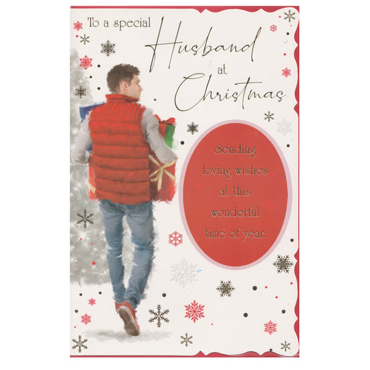 Front of this husband Christmas card features an illustration of a man carrying Christmas presents, surrounded by colourful snowflakes, paired with a message.