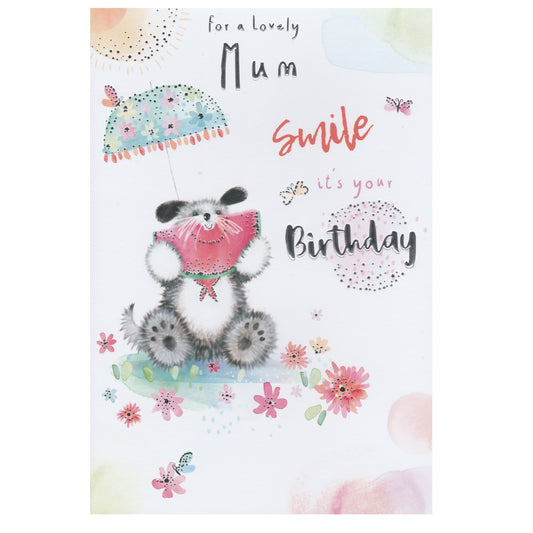 Front of this mum birthday card features a cute illustration of a dog holding a watermelon sitting on a field flowers, paired with a message.