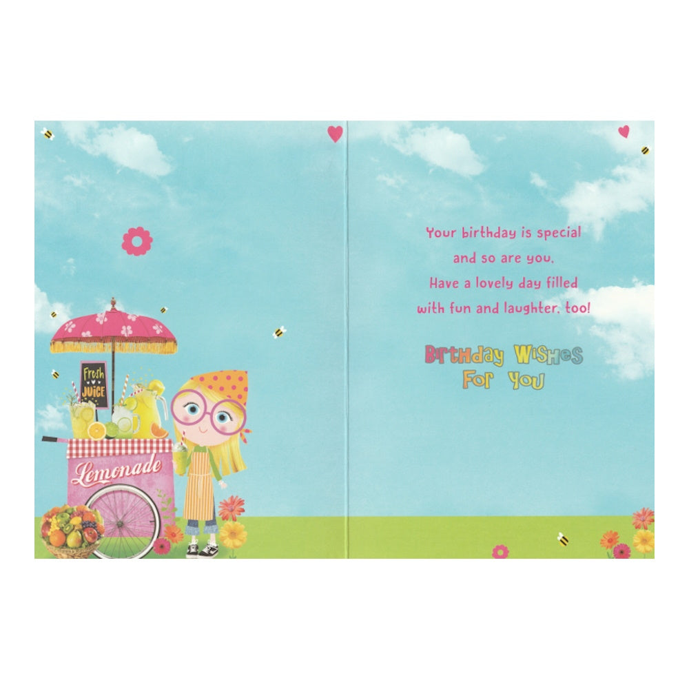 Front of this niece birthday card features an illustration of a girl and a pink lemonade stand, paired with a message