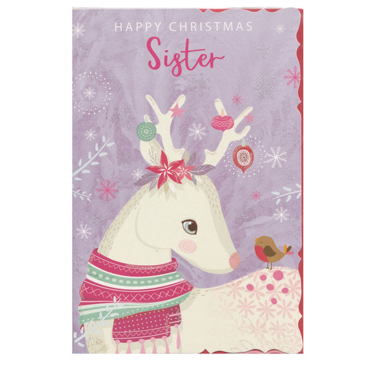Front of this sister Christmas card features an illustration of a white reindeer with antlers decorated with Christmas baubles, paired with a message,