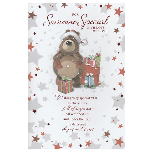 Front of this open christmas card features an illustration of a bear and presents, paired with a message.