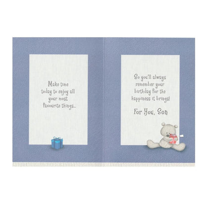 Front of this card features an illustration of a teddy bear holding a gift with the text 'Loving Birthday Wishes SON'.