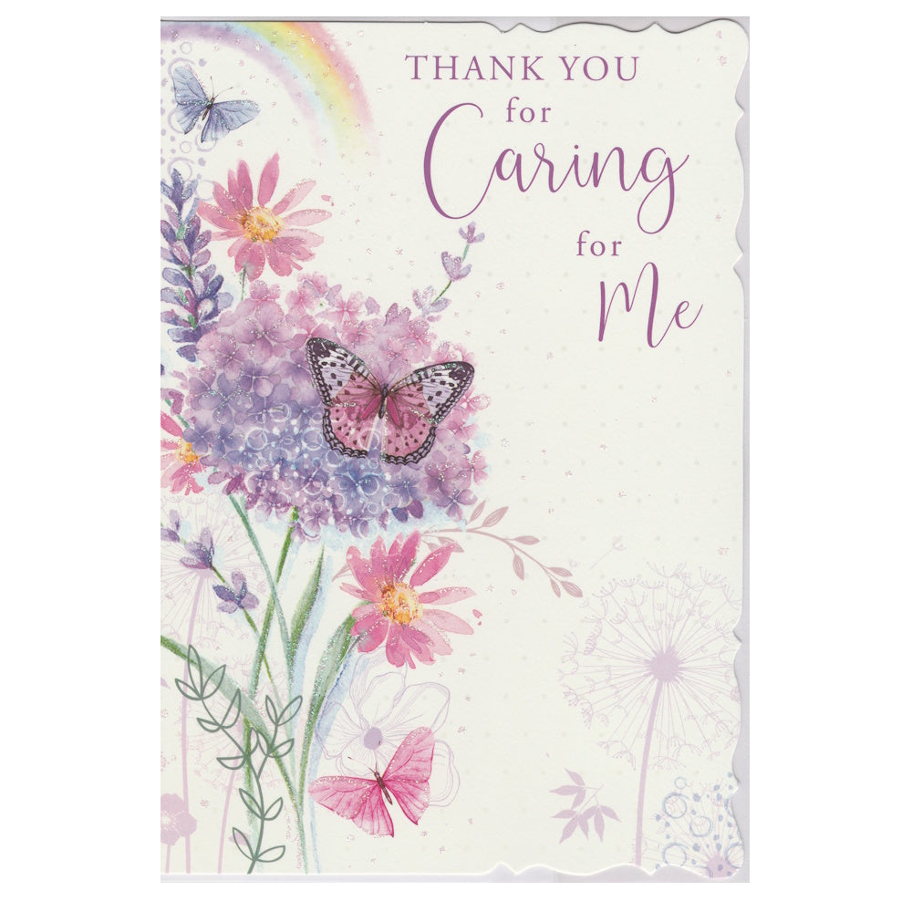 This thank you card has an illustration of a rainbow, flowers and a butterfly with the text 'THANK YOU for Caring for Me'. Glitter detail.