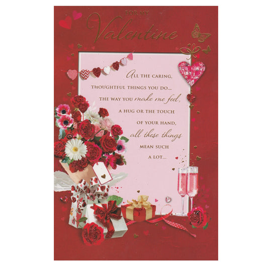 Front of this valentine's day card features an illustration of pink champagne flutes and flowers, paired with a message.
