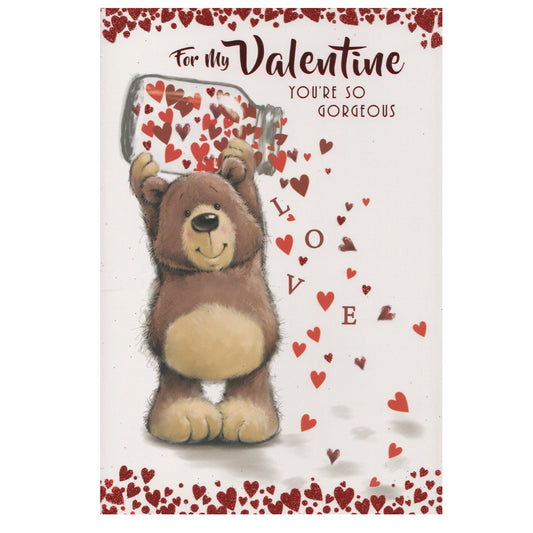 Front of this valentine's day card features an illustration of a bear holding a jar with cascading hearts spelling the word love and the message 'To my Valentine, You're So Gorgeous'.